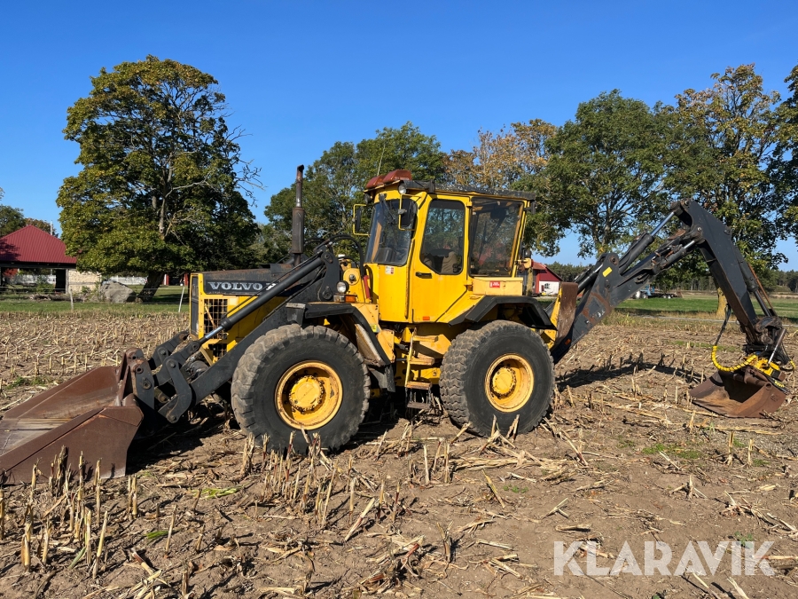 Grävlastare Volvo BM 6300 med tiltrotator, grip & skopor