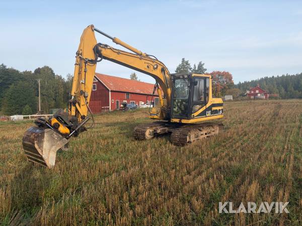 Grävmaskin CAT 312B med tiltrotator