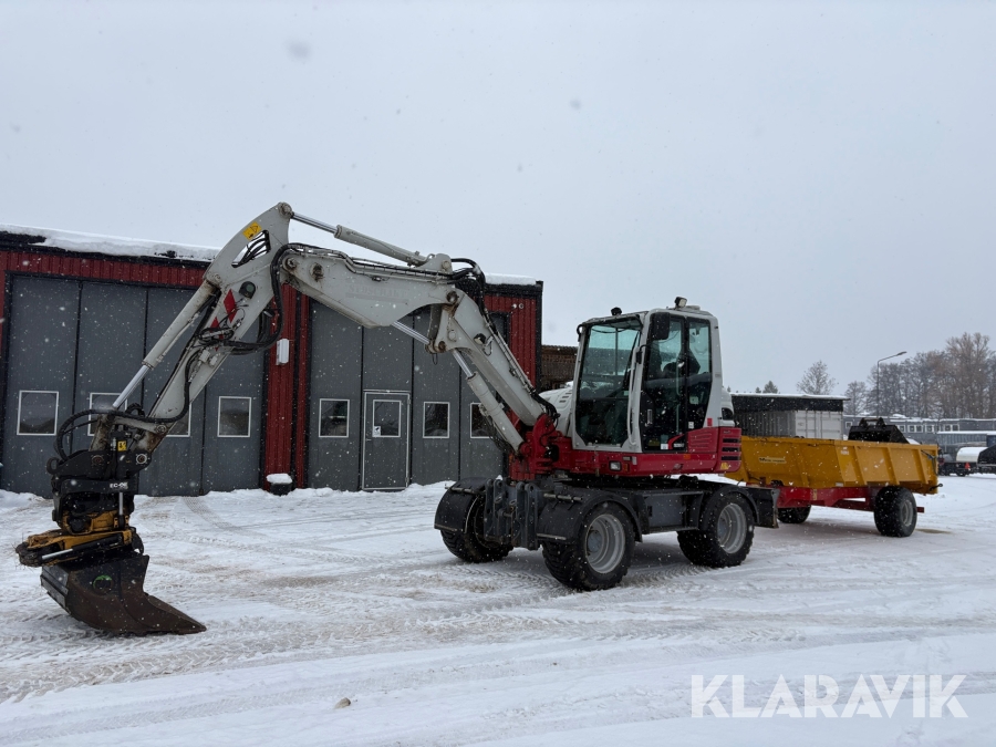 Grävmaskin Take-Job TB295W med kärra och flera redskap
