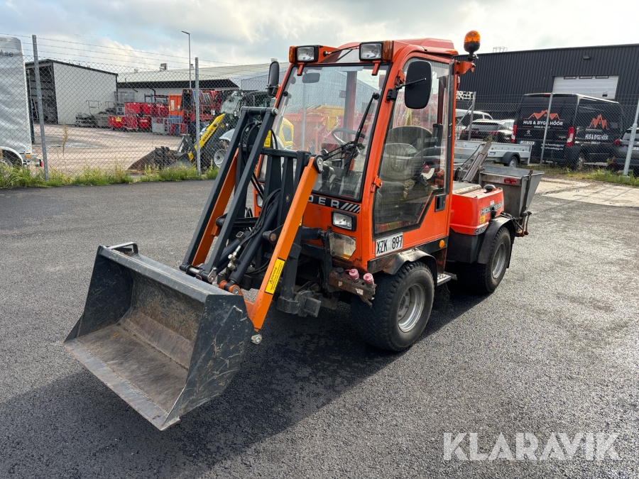 Redskapsbärare Holder C 2.34 med snöredskap och frontlastare