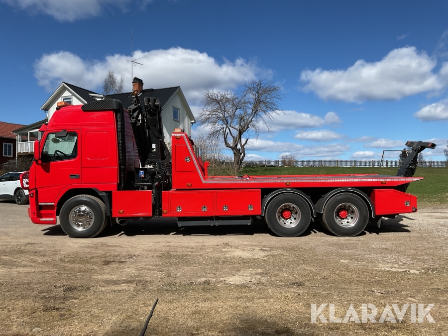 Tungflaksbärgare med kran Volvo FM12