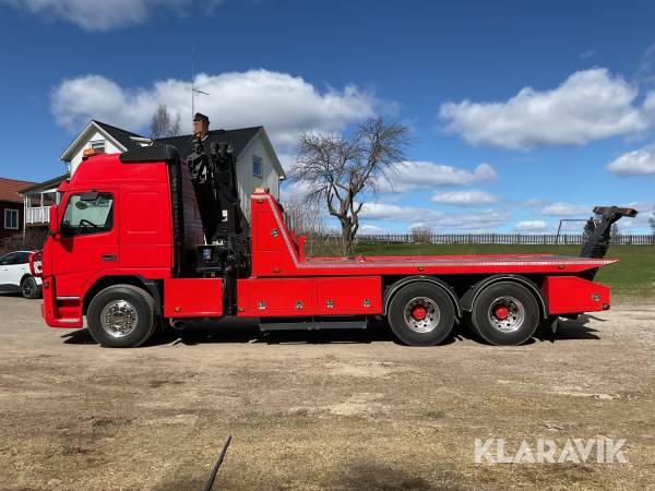 Tungflaksbärgare med kran Volvo FM12