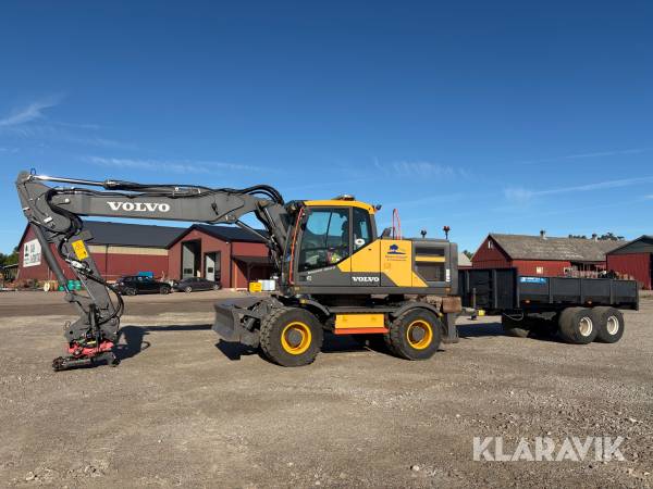 Grävmaskin Volvo EW180E med redskap och vagn