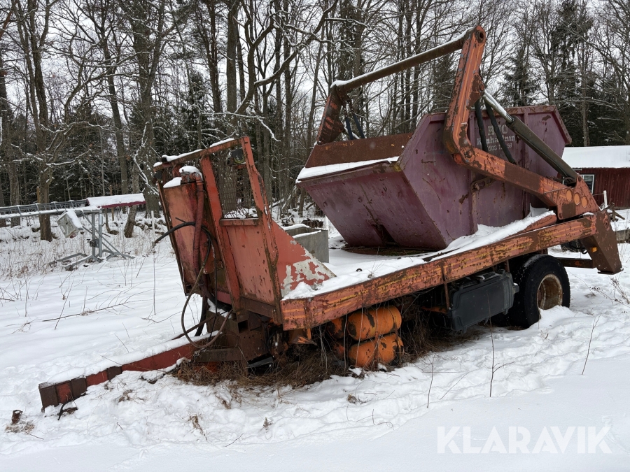 Liftdumperkärra med liftdumpercontainer