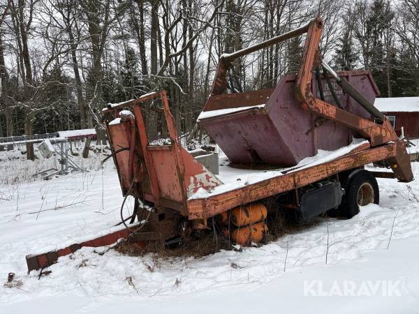 Liftdumperkärra med liftdumpercontainer
