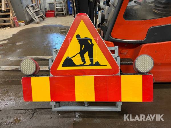 Belyst Varningsskylt med elmotor