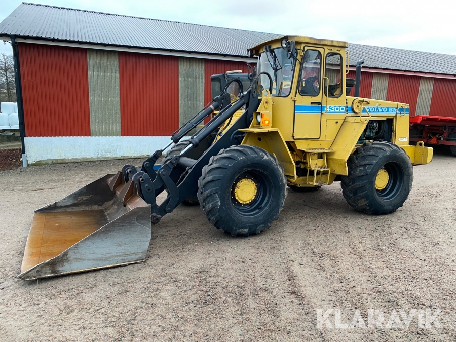 Hjullastare Volvo BM 4300 B med planeringsskopa