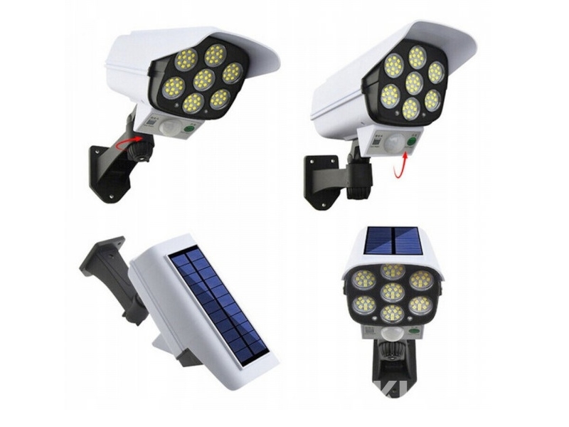 Kamera attrapp med inbyggd strålkastare.