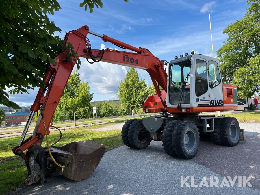 Grävmaskin Atlas 1204 med redskap