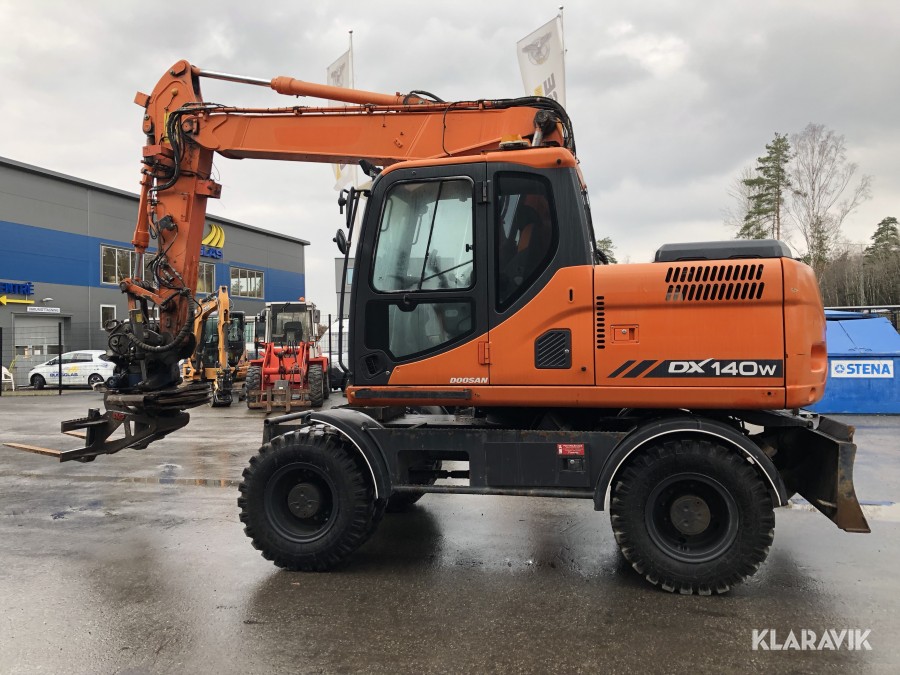Hjulgrävare Doosan DX140W med redskap