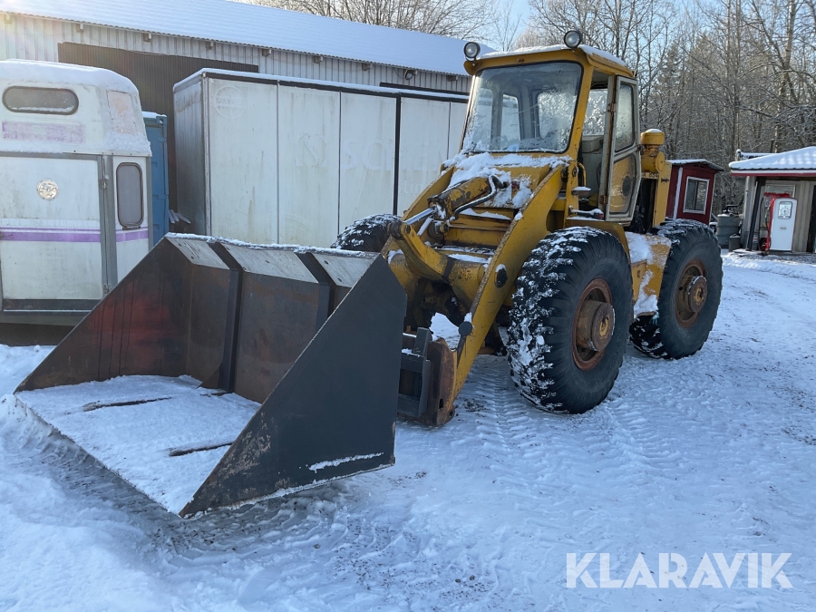 Lastmaskin Parca 854 med skopa och gafflar