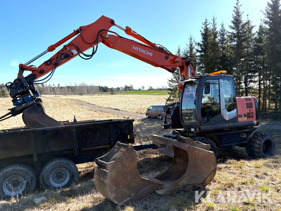 Grävmaskin Hitachi ZX145W-3 med vagn och redskap