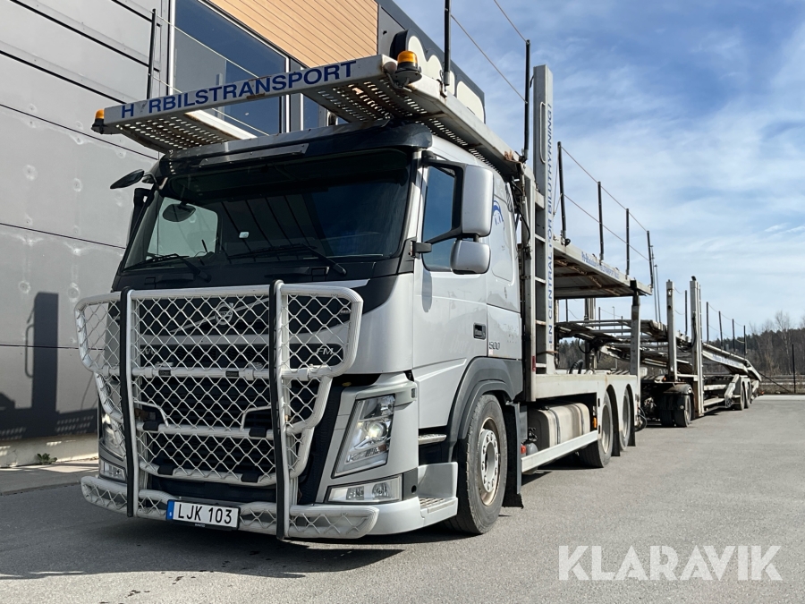 Lastbil / biltransport Volvo FM 12.8 med släp