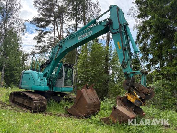Grävmaskin Kobelco SK235SR med rototilt och redskap