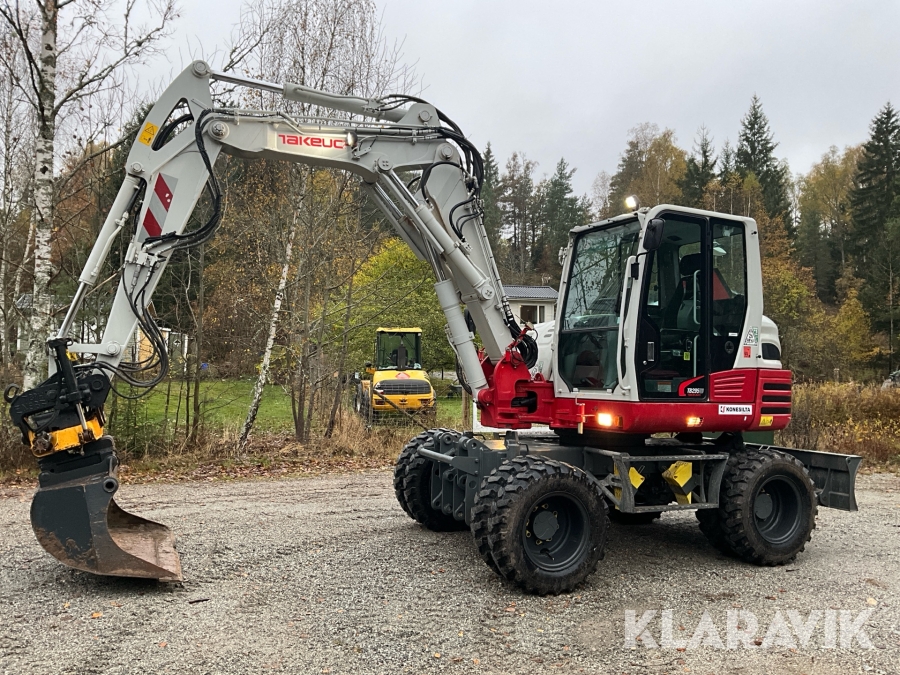 Grävmaskin Takeuchi TB295W med tiltrotator och skopa