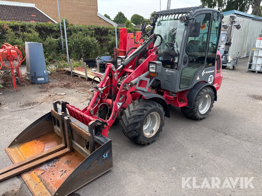 Hjullastare Weidemann 1250 CX35 med skopa och gafflar