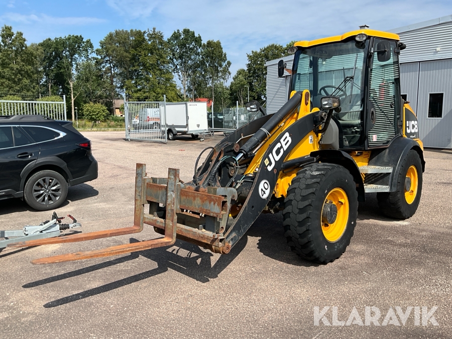 Hjullastare JCB 409 inklusive redskap