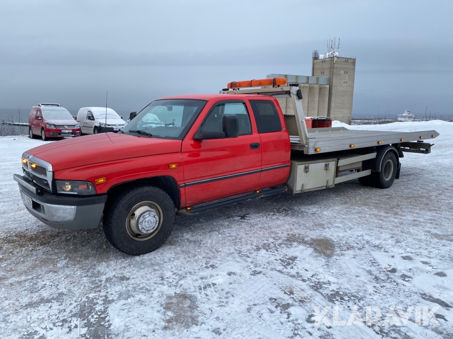 Flakbärgare Dodge Carrier Laramie slt med flakvinsch