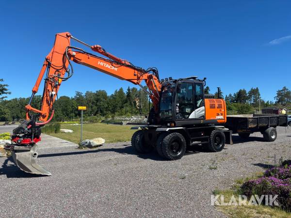 Grävmaskin Hitachi ZX140W-6 med GPS tiltrotator och kärra