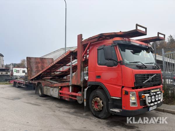 Lastbil Biltransport Volvo FM9 med släp