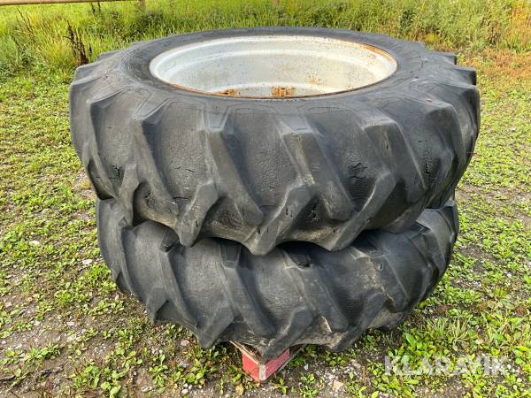 Traktordäck Firestone 16.9-34 1par med ringar och spännare