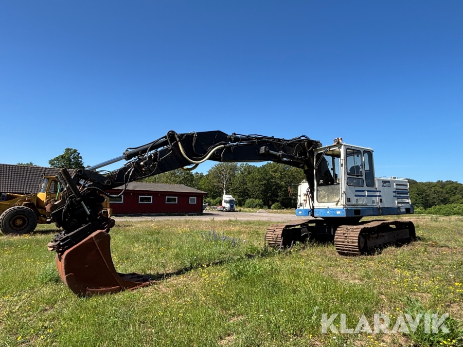 Grävmaskin Volvo EC200 med tiltrotator och skopa