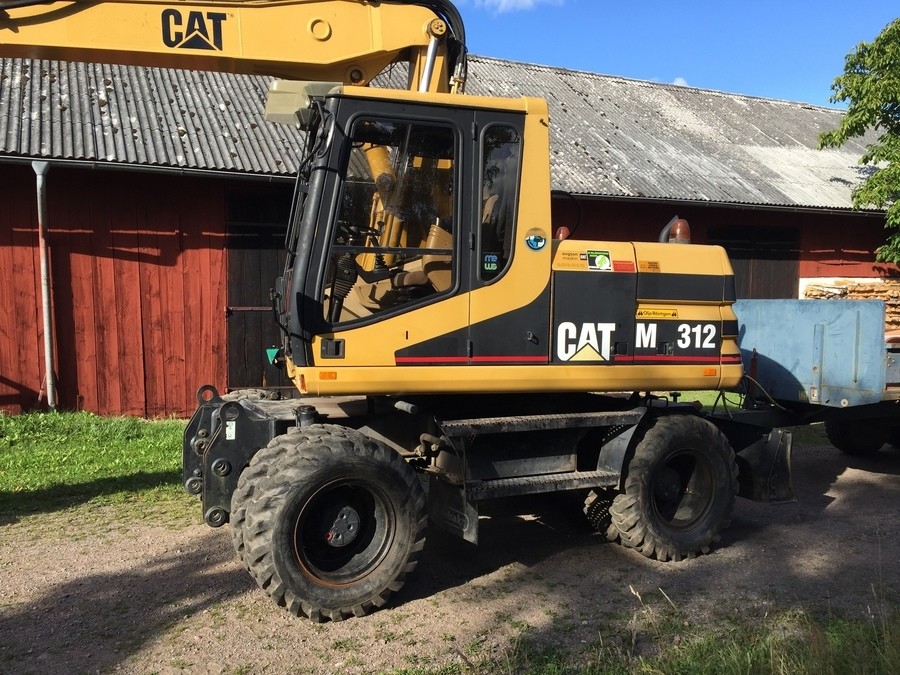 CAT M312 med vagn
