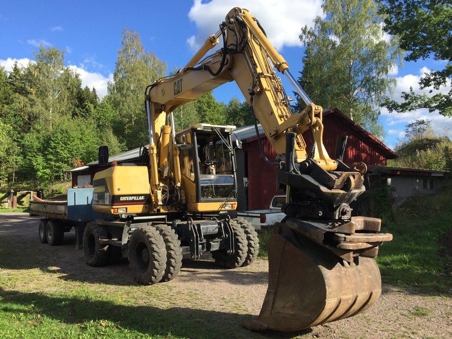 CAT M312 med vagn