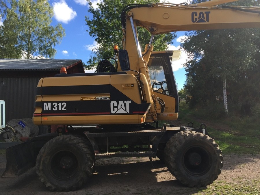 CAT M312 med vagn