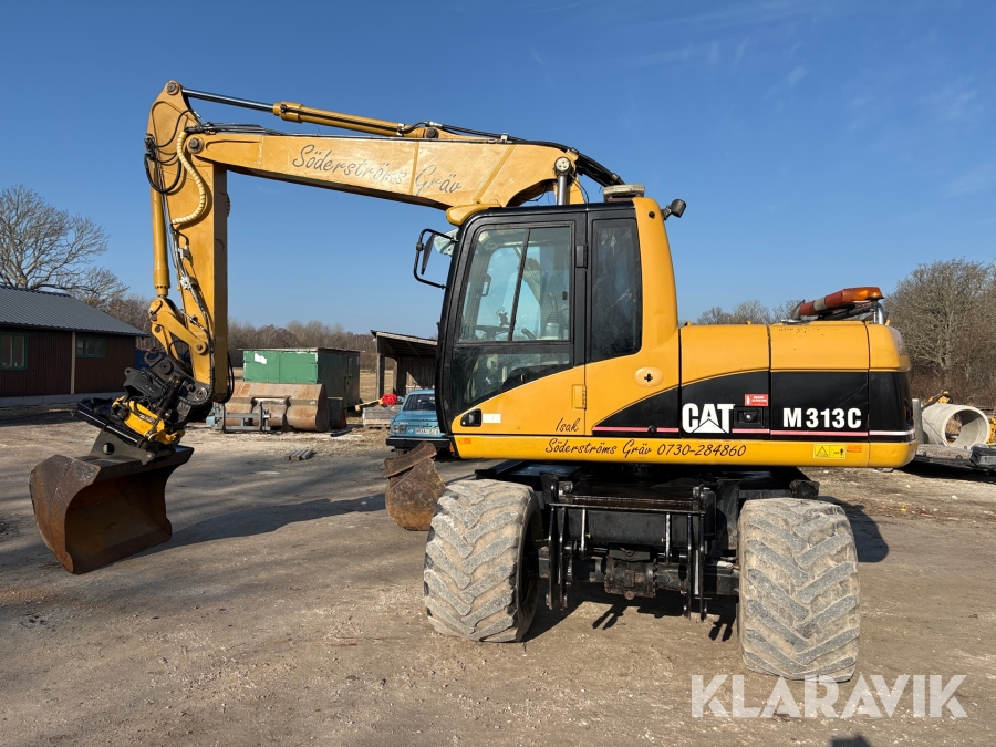 Grävmaskin CAT M313C+ med skopor