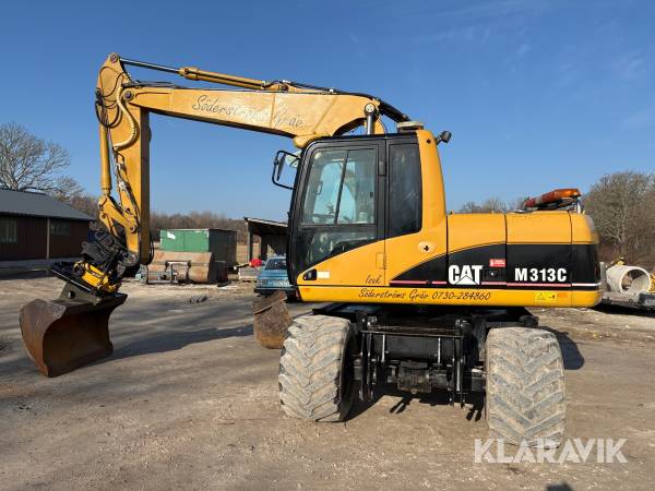 Grävmaskin CAT M313C+ med skopor