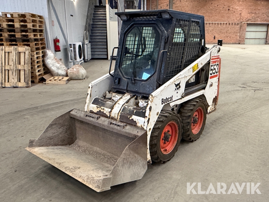 Kompaktlastare Bobcat 553 / skopa/ gafflar