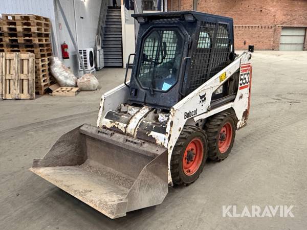 Kompaktlastare Bobcat 553 / skopa/ gafflar