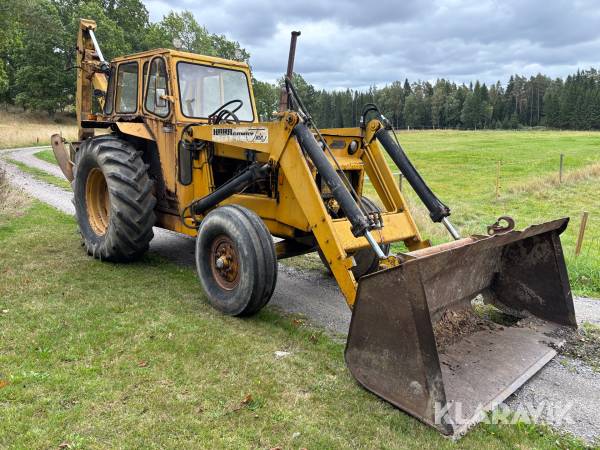 Traktorgrävare Hymas 467 Hara Caway Twin med gafflar och skopor