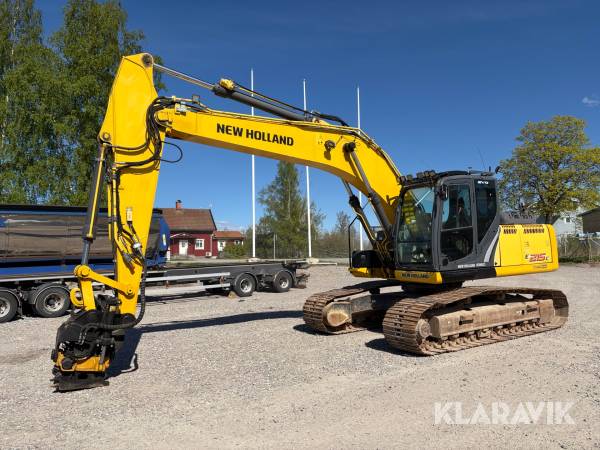 Grävmaskin New Holland E 215C med tiltrotator