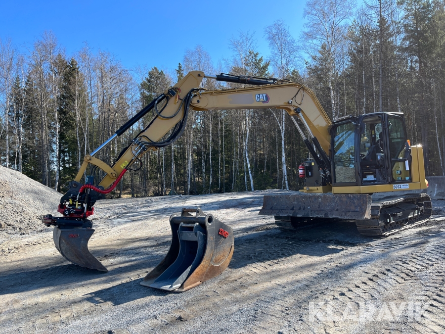Grävmaskin CAT 310 med redskap