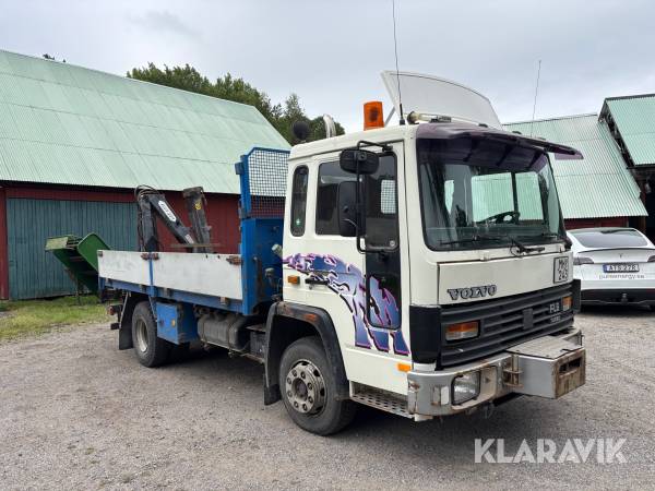 Kranbil Volvo FL 611 med tippflak