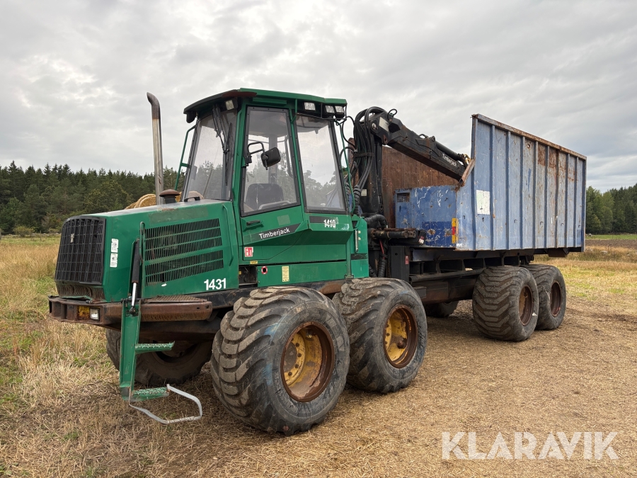 Skotare med tippcontainer Timberjack