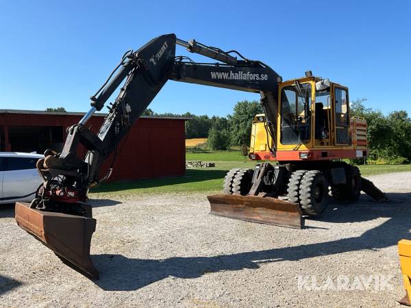 Grävmaskin Åkerman H7MC med tiltrotator och planerskopa