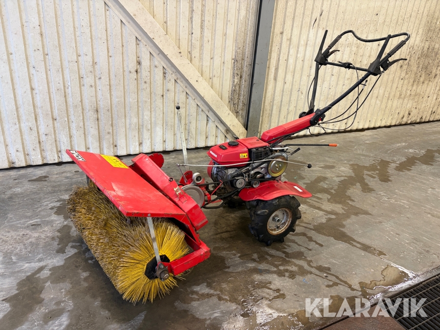 Redskapsbärare Honda med sopvals