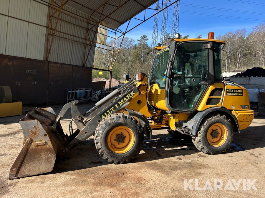 Hjullastare Volvo L25F med skopa & gafflar