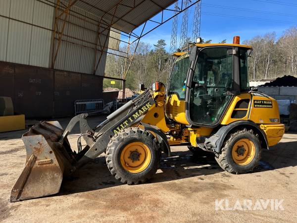 Hjullastare Volvo L25F med skopa & gafflar