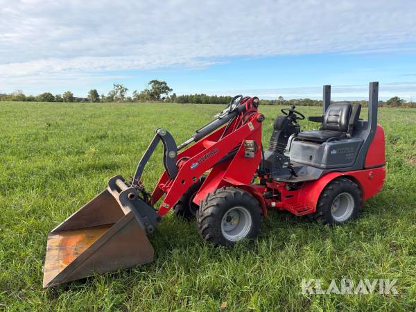 Kompaktlastare Flexitrac 1126 med redskap