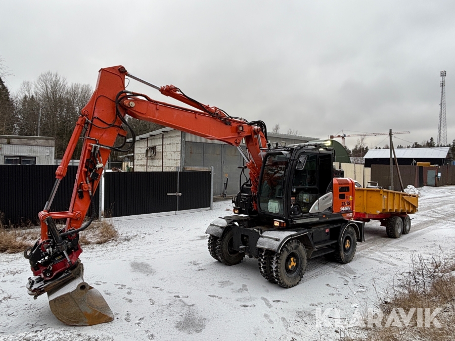 Hjulgrävare Hitachi ZX145W med 3-D grävsystem, rototilt, redskap & kärra