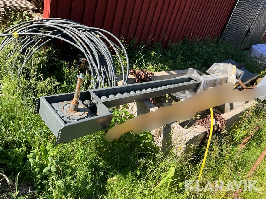 Fjäderomrörare med matarskruv till flisanläggning HDG