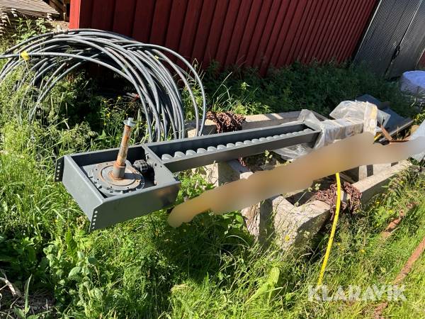 Fjäderomrörare med matarskruv till flisanläggning HDG