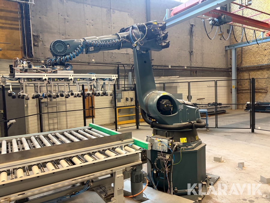Packrobot Kuka KR 150 L110-2 2000 med skyddsbur och bord
