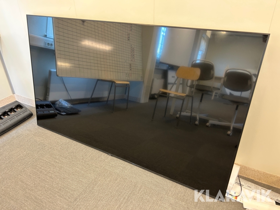 TV Samsung 75 tum UE75TU6905 på arm