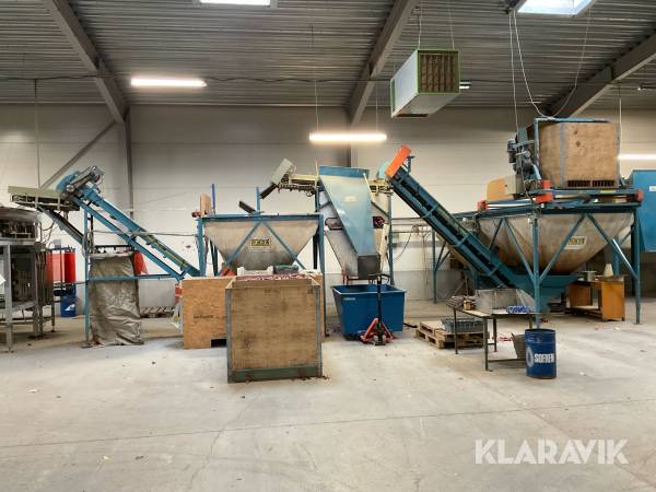 Trevira-silo med lådvändare med sorteringsbord EMVE