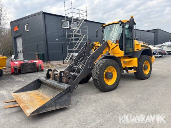 Hjullastare Volvo L45G med skopa och gafflar